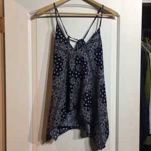 Blue and white tank with draw strong back detail